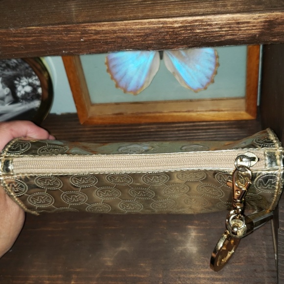 Michael Kors Metallic Logo Embossed Clutch Bag - Picture 6 of 8